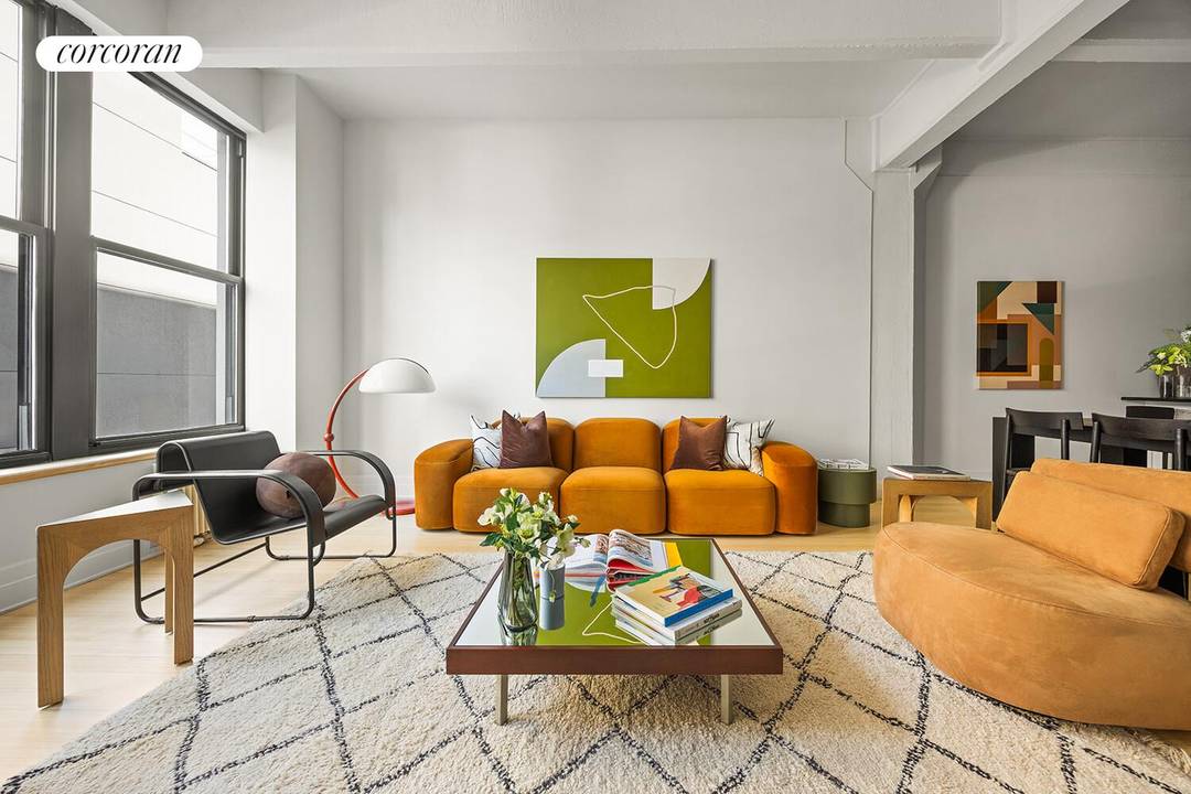 A refined, authentic DUMBO loft, this expansive 1, 200 SF studio with a thoughtfully designed home office lives seamlessly as a one bedroom, offering exceptional volume, flexibility, and quiet sophistication.