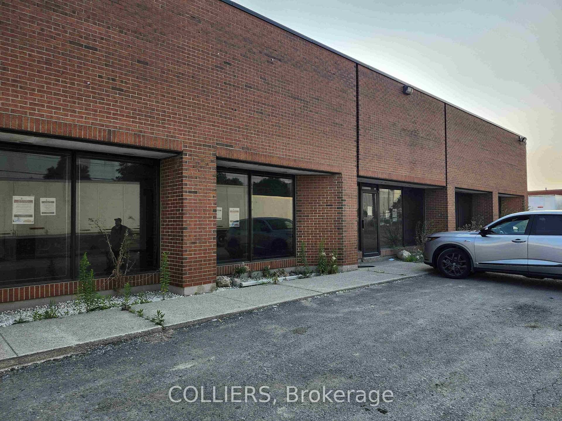 Upgraded lighting super clean building with lots of natural light and massive fenced parking area.