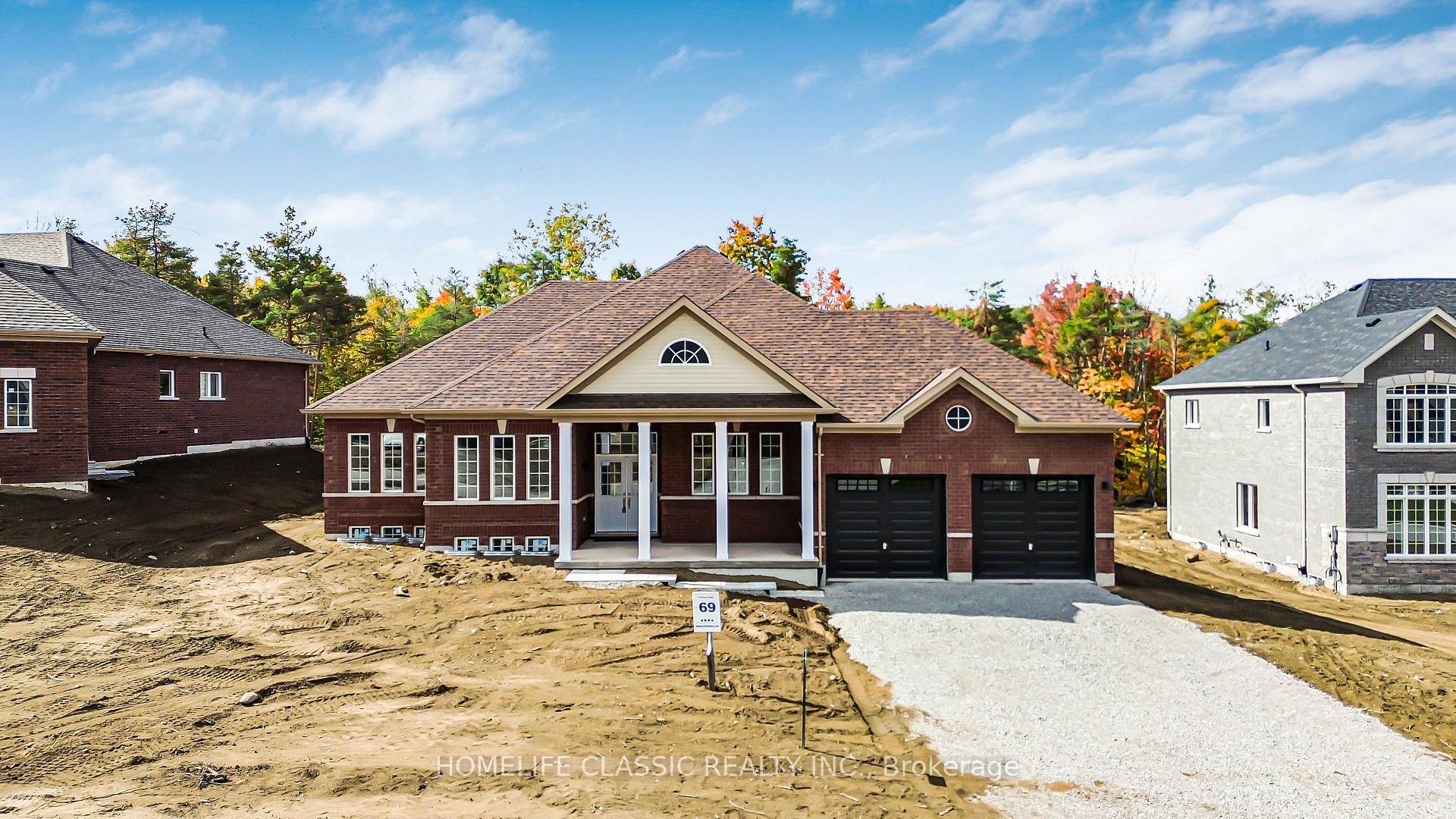 Welcome to 74 Ruby Ridge, a stunning brand new, never lived in 2, 170 square foot bungalow set on a picturesque 0.