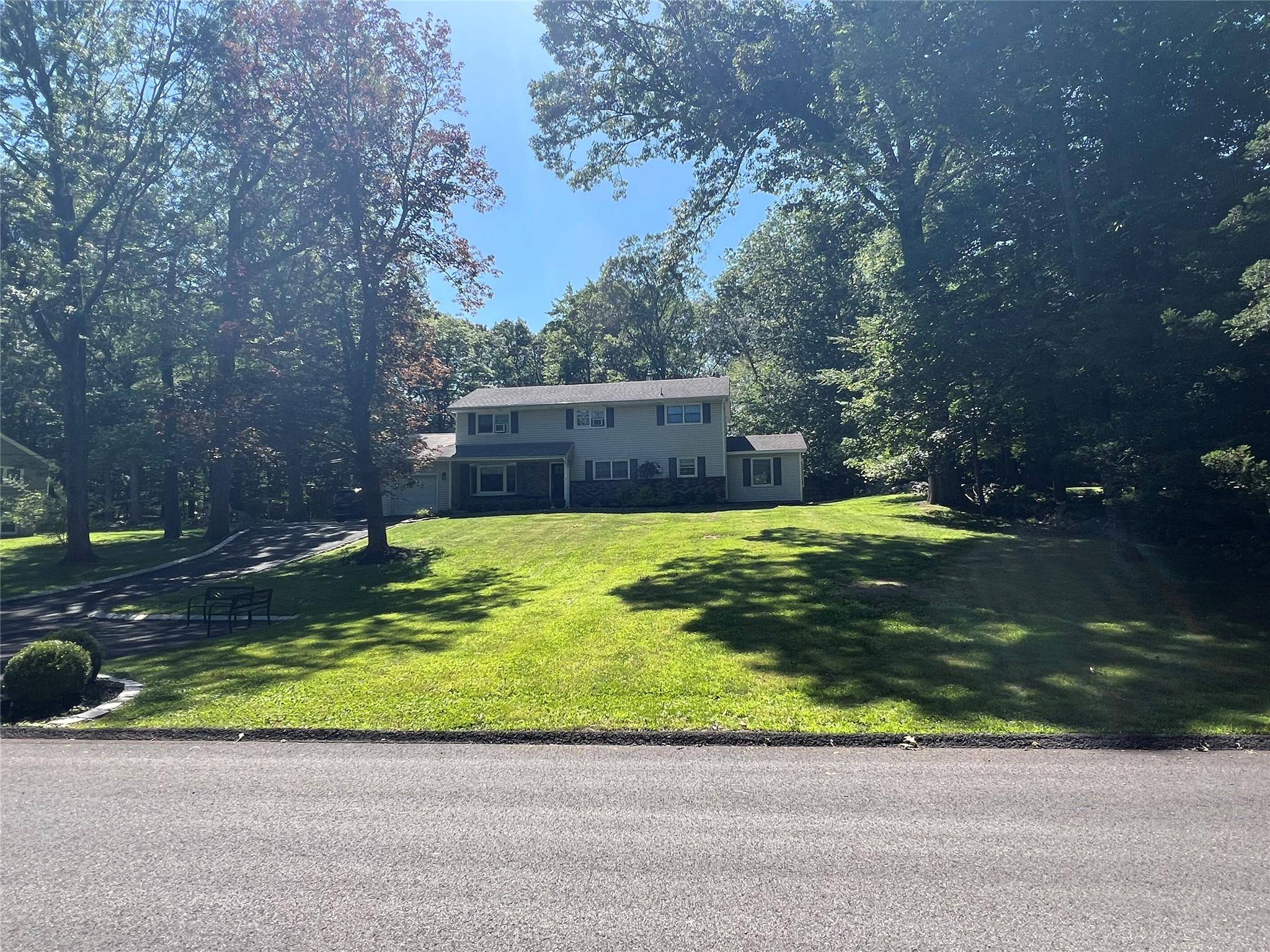 Walk into this immaculate, beautiful home sitting on a huge park like property.