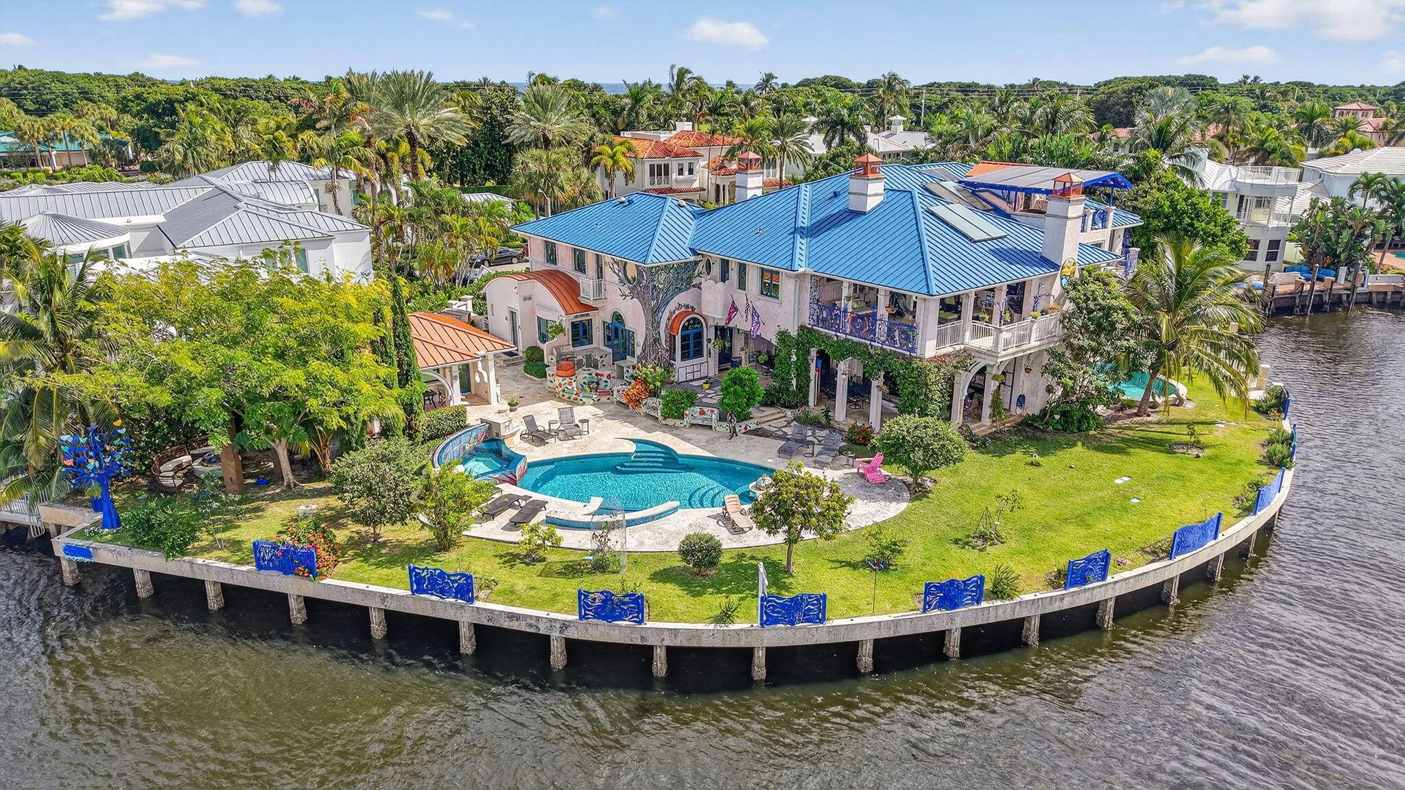 This exceptional crown jewel, one of a kind waterfront estate, nestledon a quiet cul de sac, exemplifies the finest artisans from around theworld.