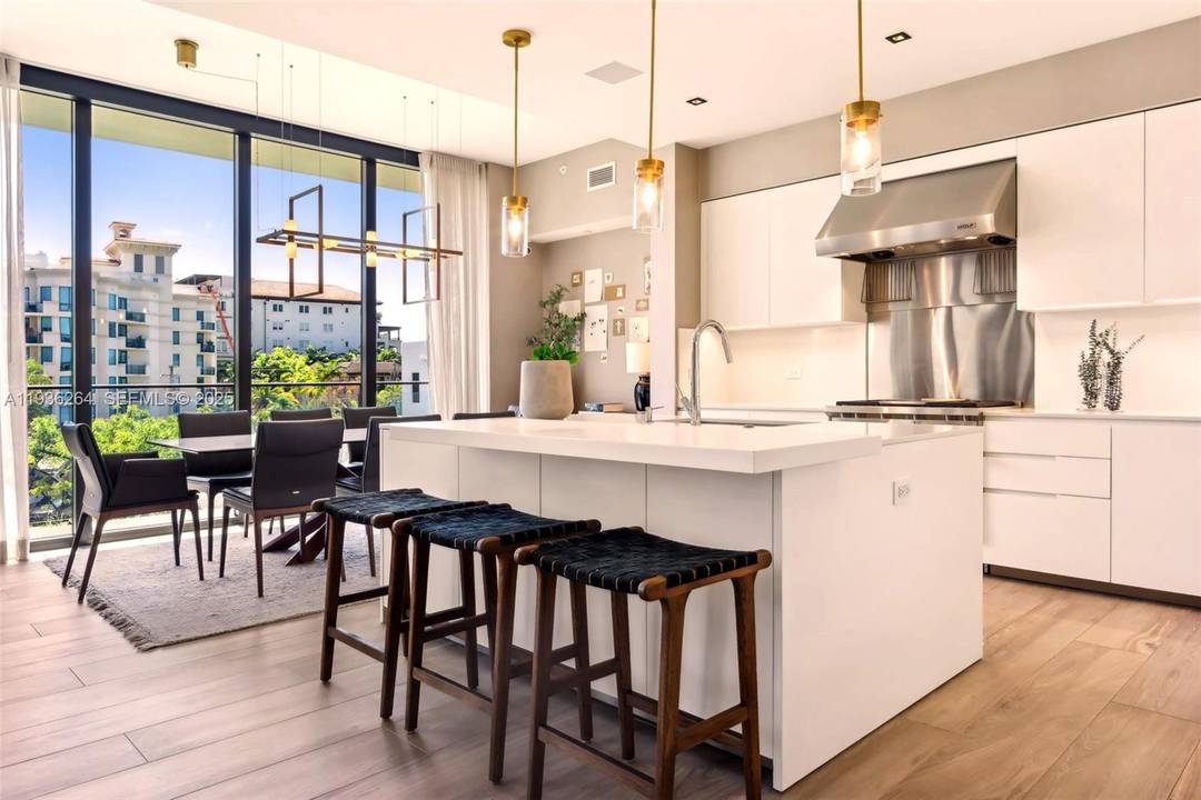 Welcome to Fairchild Coconut Grove, a turnkey furnished residence with 11 ceilings, 3 bedrooms, 4.