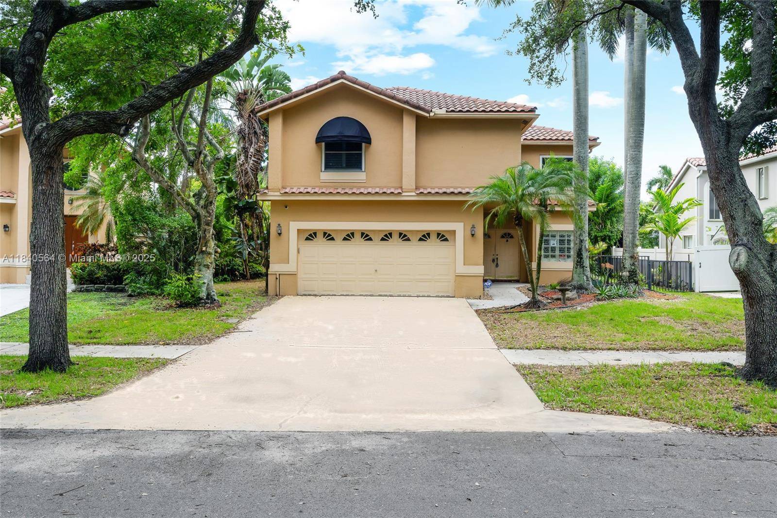 This house is situated in a tree lined street in a spectacular neighborhood.
