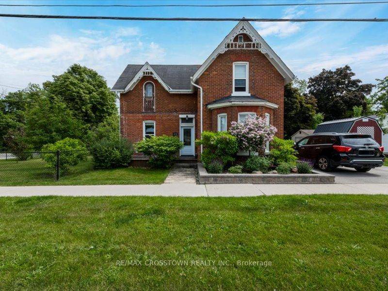 Charming character filled century home on corner lot.