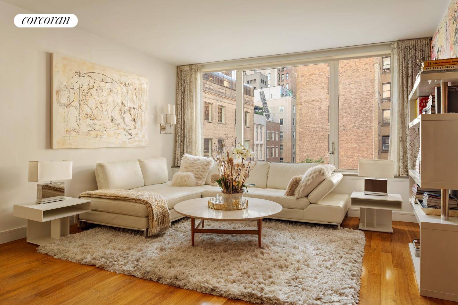 Sleek One Bedroom with Private South and West Facing Balcony Near Central Park Located on East 85th Street between Fifth and Madison Avenues, this elegant one bedroom residence offers a ...