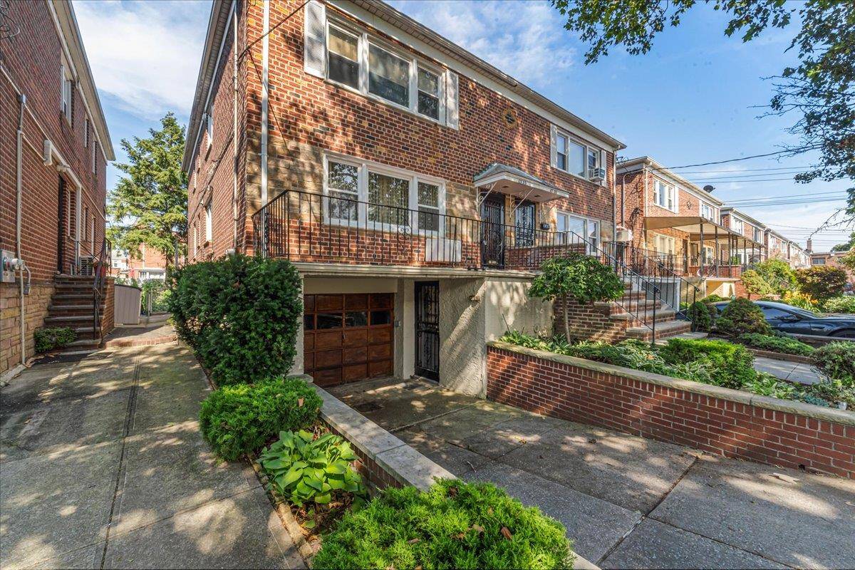 Welcome to this charming semi detached two family home located in the heart of Middle Village, just steps away from the beautiful Juniper Valley Park.