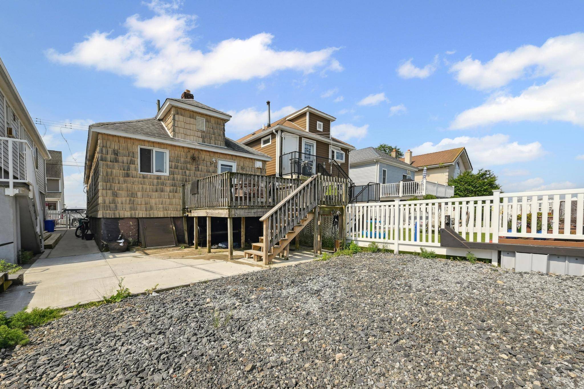 Bungalow Bliss ! Your waterside oasis awaits to embrace !