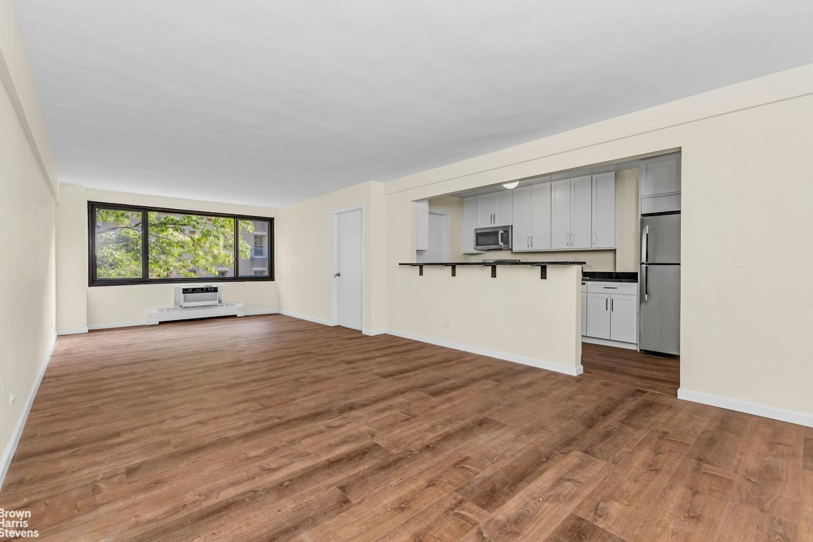 Live large in this just renovated already converted Jr.