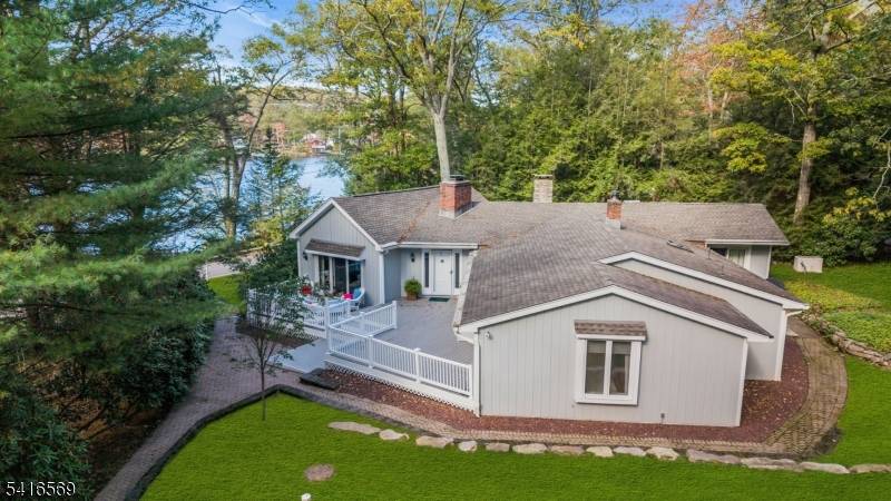 Located in Lake End Corporation, Green Pond 149 Lake End Road offers the rare opportunity to own a renovated, move in ready lakefront with a private year round dock on ...
