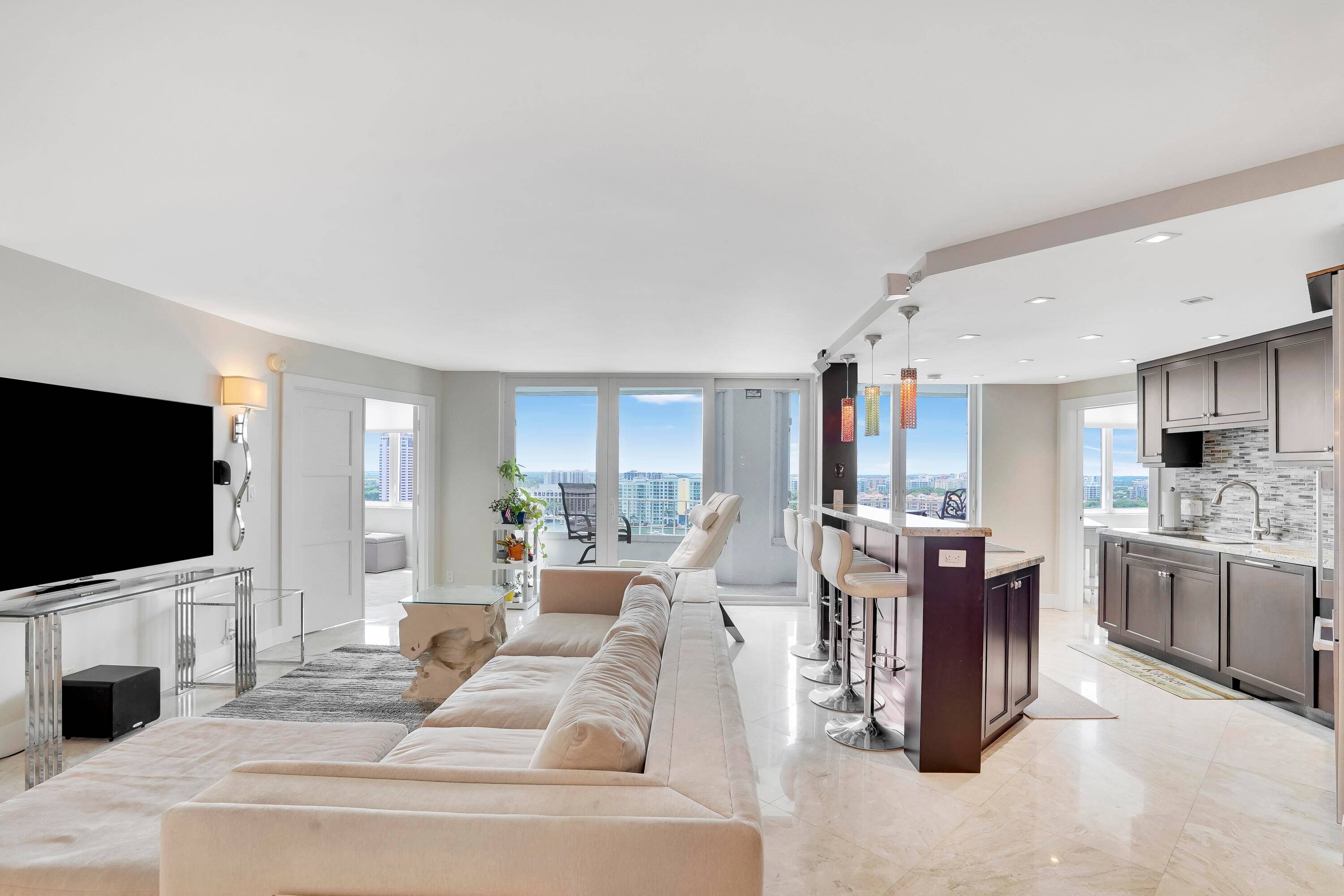 Lovely 19th floor residence overlooking Lake Boca and The Boca resort.