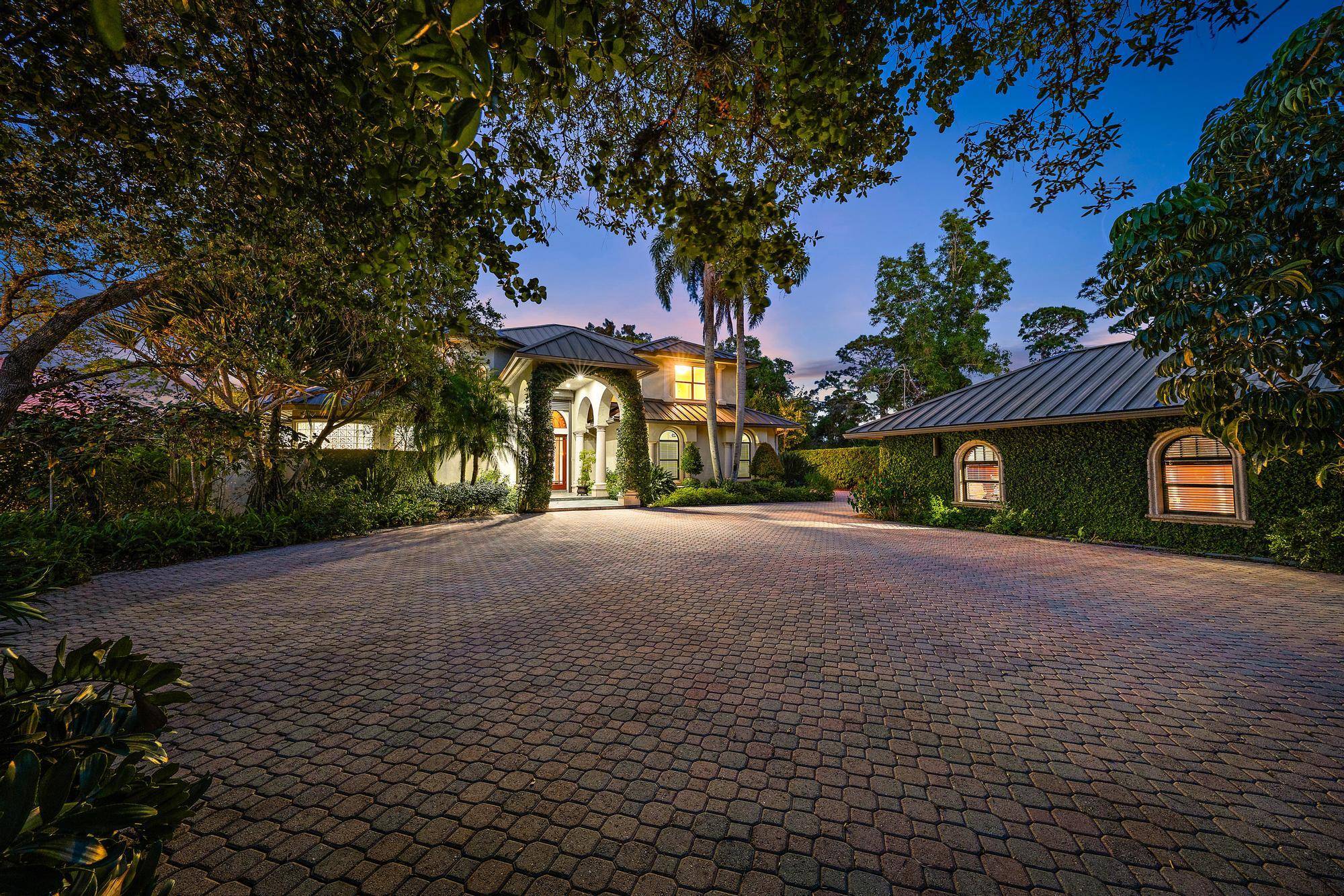 Riverfront Luxury Estate on the Loxahatchee River with Ocean Access !