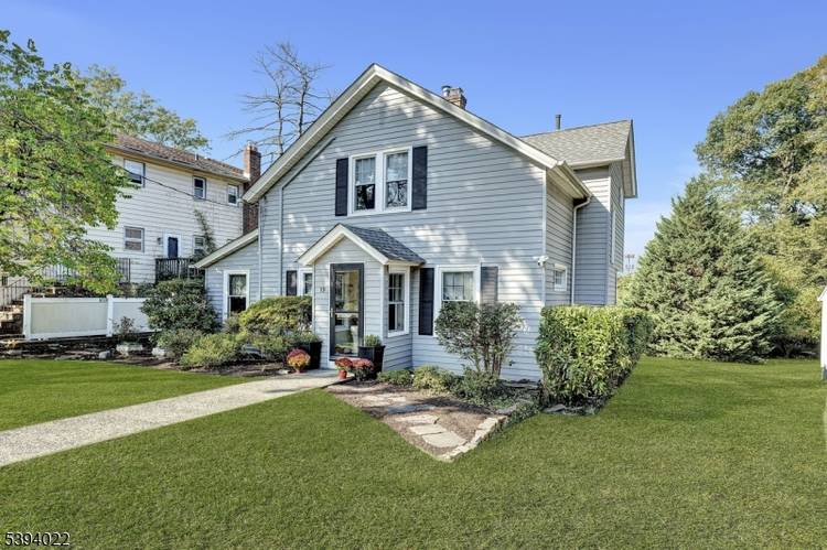 Welcome to this bright and charming Colonial, perfectly tucked away on a quiet cul de sac yet close to everywhere you need to go.