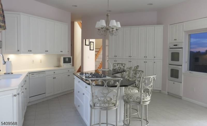 Expansive 5 bedroom, 4 bath home offering over 5, 100 square feet of living space on more than an acre in desirable Little Silver.