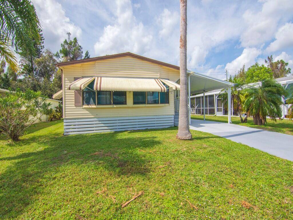 Discover comfortable living in this delightful 2 bedroom, 2 bathroom mobile home located in the highly desirable Spanish Lakes Golf Village, a 55 active community in Port St.