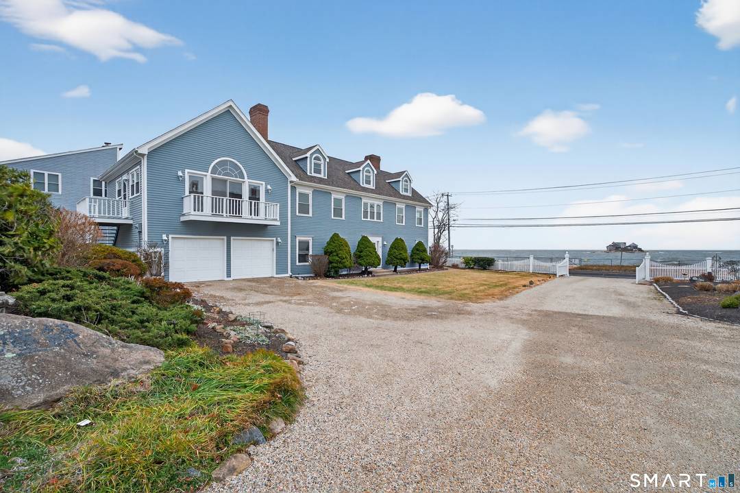 This extraordinary waterfront retreat offers an unparalleled blend of elegance, comfort, and expansive coastal living.