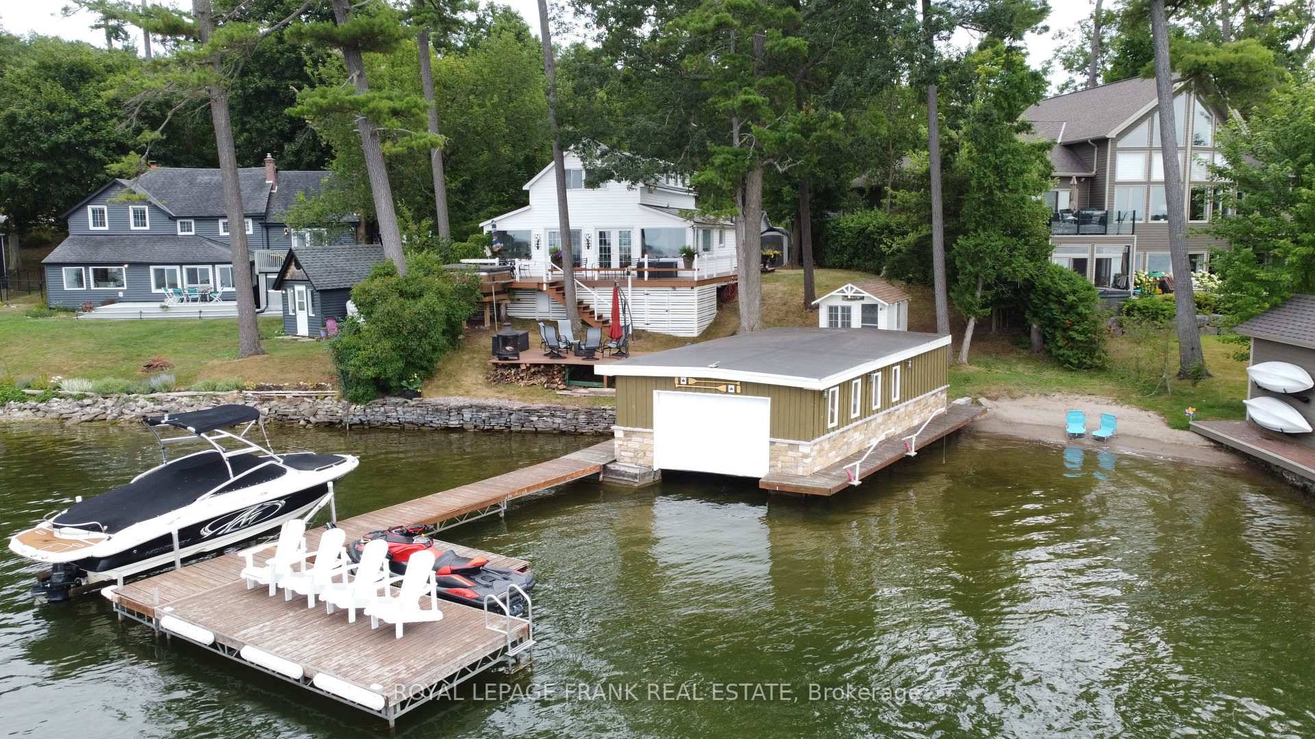 Spectacular 4 Season Lakefront Home on Sandy Beach Chemong Lake south of the Causeway.
