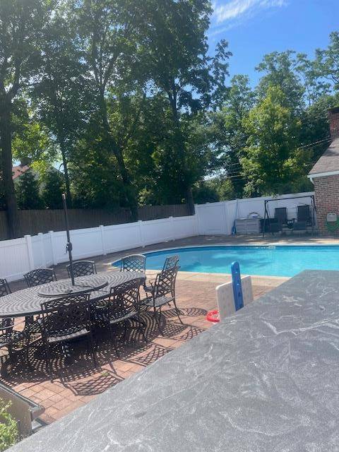 Welcome home ! This spacious brick four bedroom, three bathroom home with an additional bonus room lives like a five bedroom.