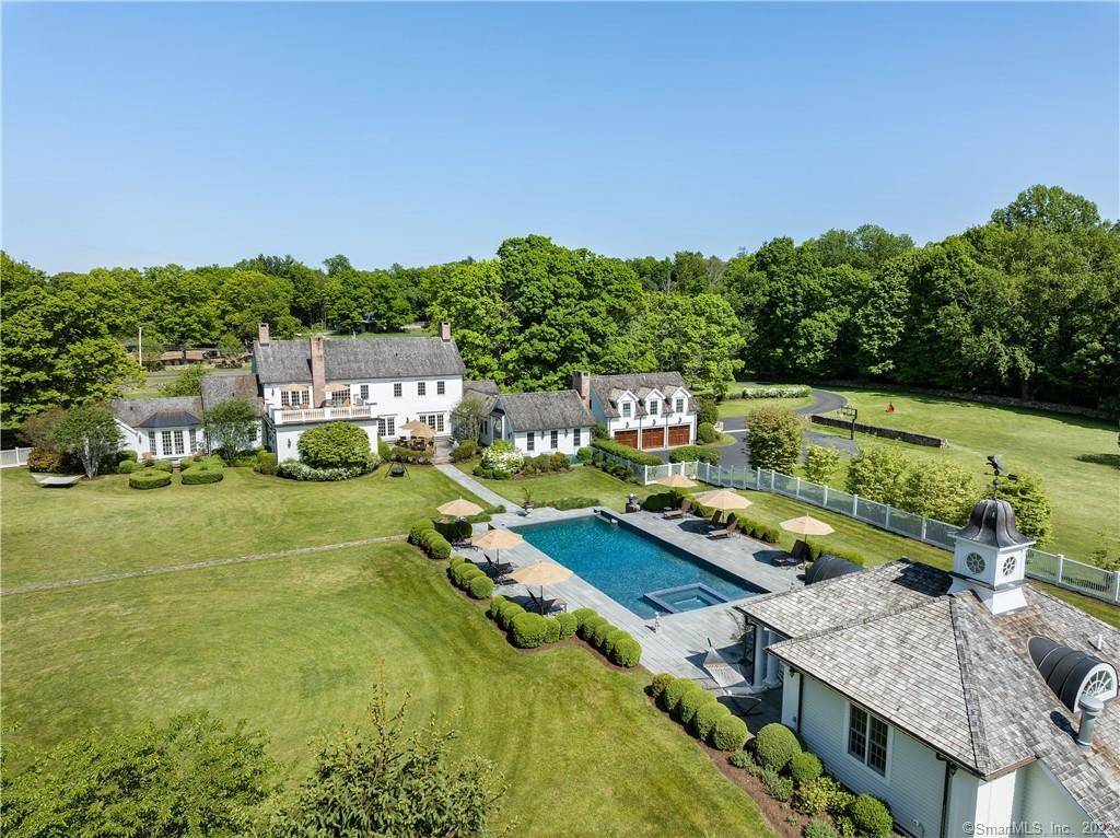 Welcome to 229 Umpawaug Road, the quintessential estate of exceptional quality on the premier scenic road in Redding, Connecticut in Fairfield County.