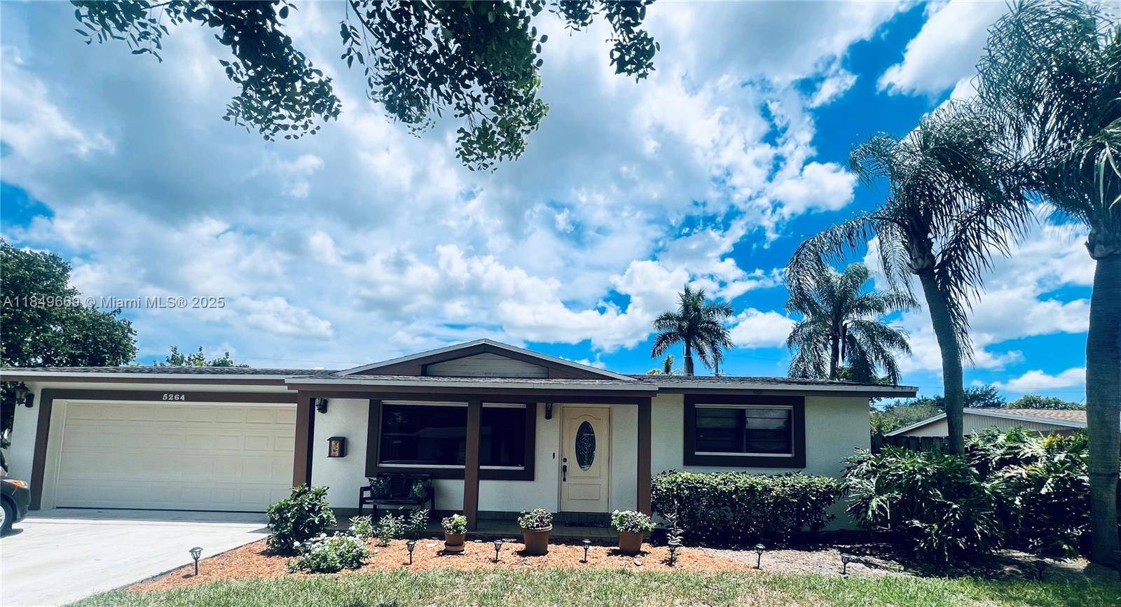 WELCOME HOME ! Move in ready 4 bedroom, 2 bath home featuring a private pool, two car garage, and a functional layout designed for comfortable living.