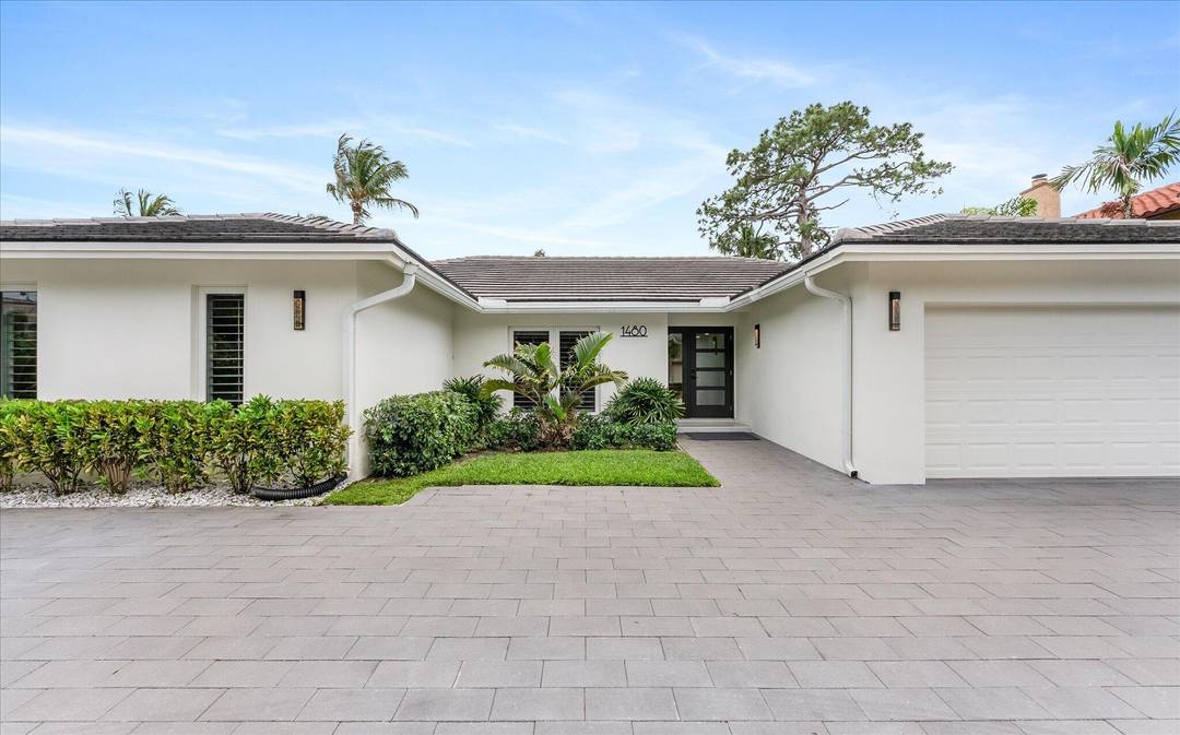 Located in highly coveted Palm Beach Farms in Boca Raton, this beautifully renovated residence offers zoning for A rated schools and has no associated HOA fees.