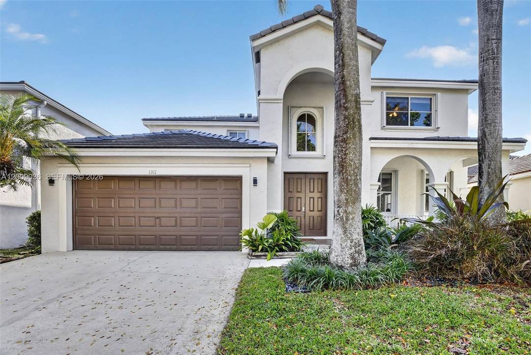 Welcome to this beautifully updated two story home in the desirable gated community of Savanna in Weston, FL, featuring scenic walking trails and resort style amenities, including a spectacular clubhouse ...