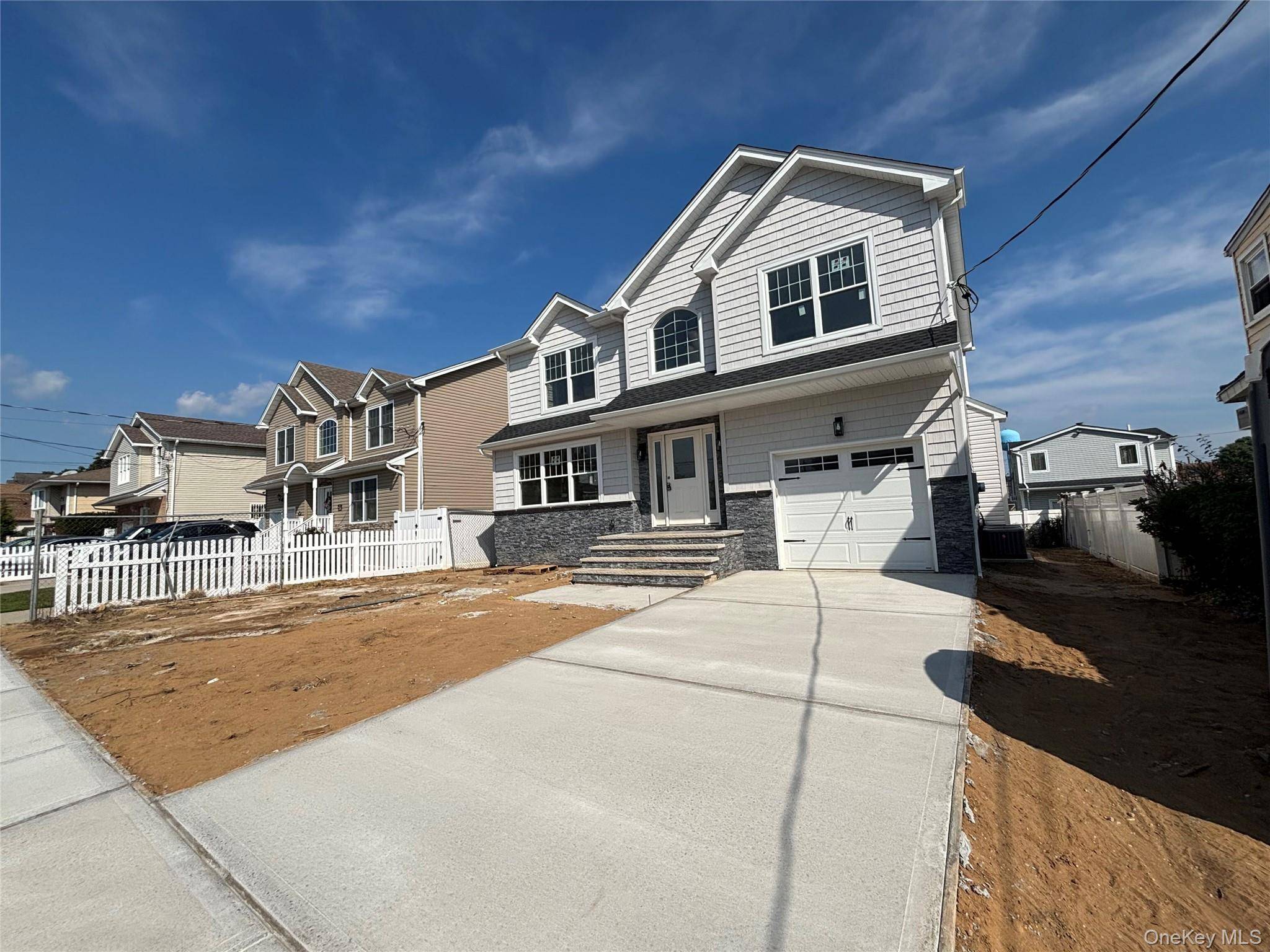Welcome To This Completely Brand New Construction in Elmont !