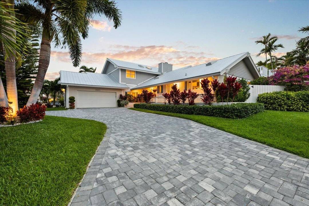 Experience coastal elegance in this stunning 5 bedroom, 4 bath beach style home in Tropic Isle, Delray Beach.