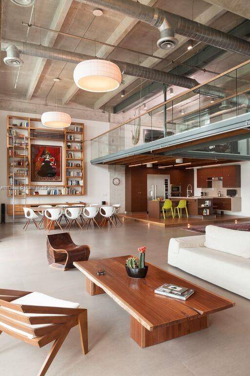 NY industrial style Penthouse loft with 20' ceilings in the heart of Miami's booming Arts Entertainment area.