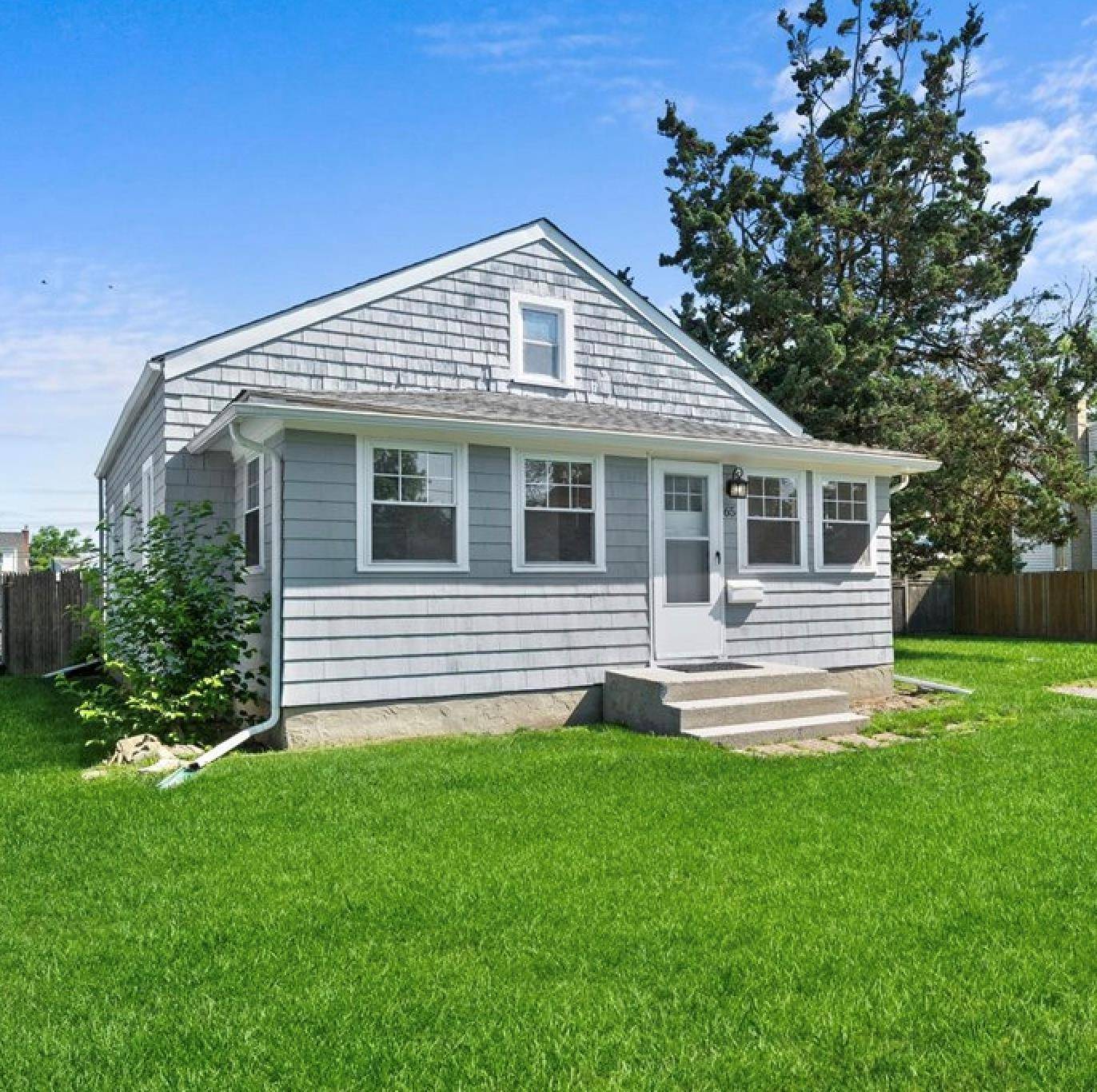 Welcome to this charming Cape Cod style home that lives like a ranch, with all rooms conveniently located on the main level.