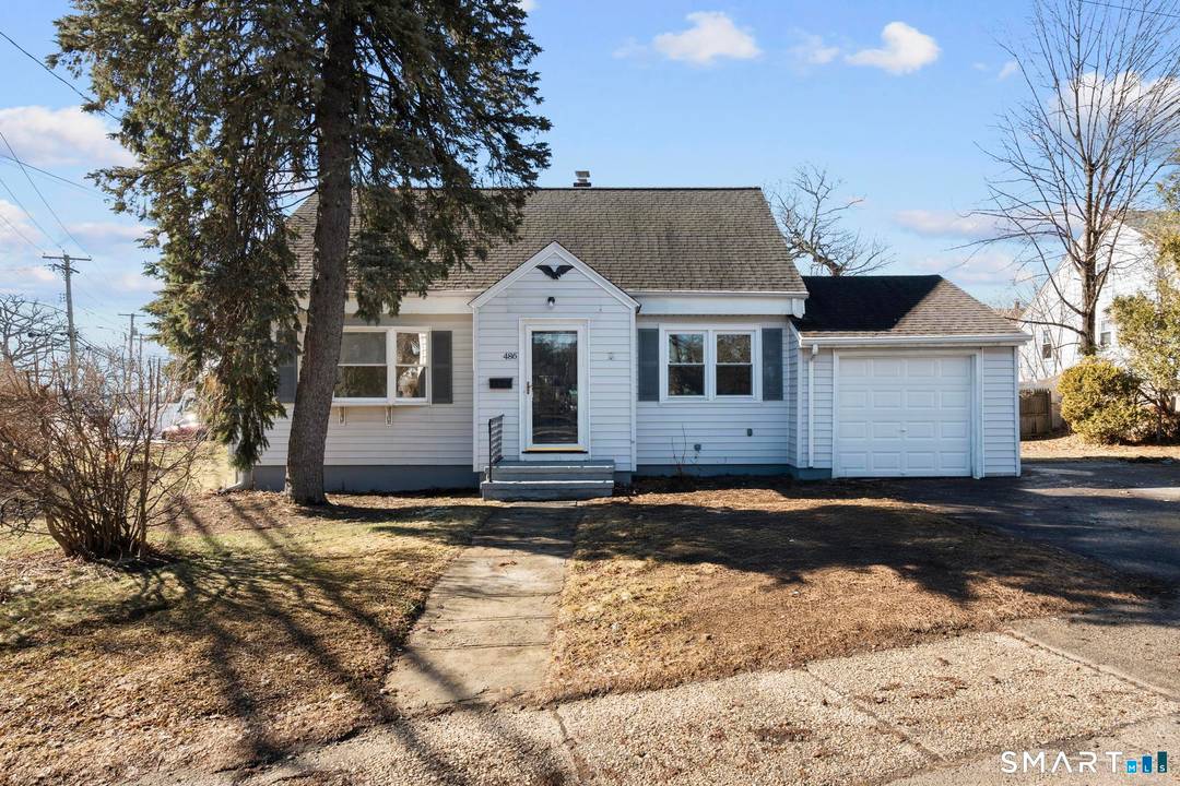 Step into this immaculately renovated Cape style home where classic charm meets modern comfort.