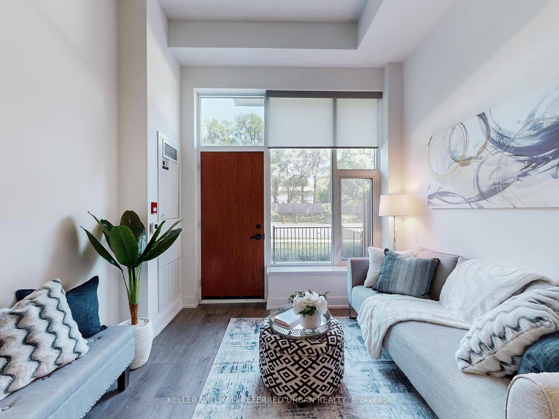 Welcome To Scala Condos A Bright And Modern 1 Den, 2 Bathroom Ground Floor Suite Offering A Spacious, Functional, And Bright Floorplan With Soaring 11 Foot Ceilings.