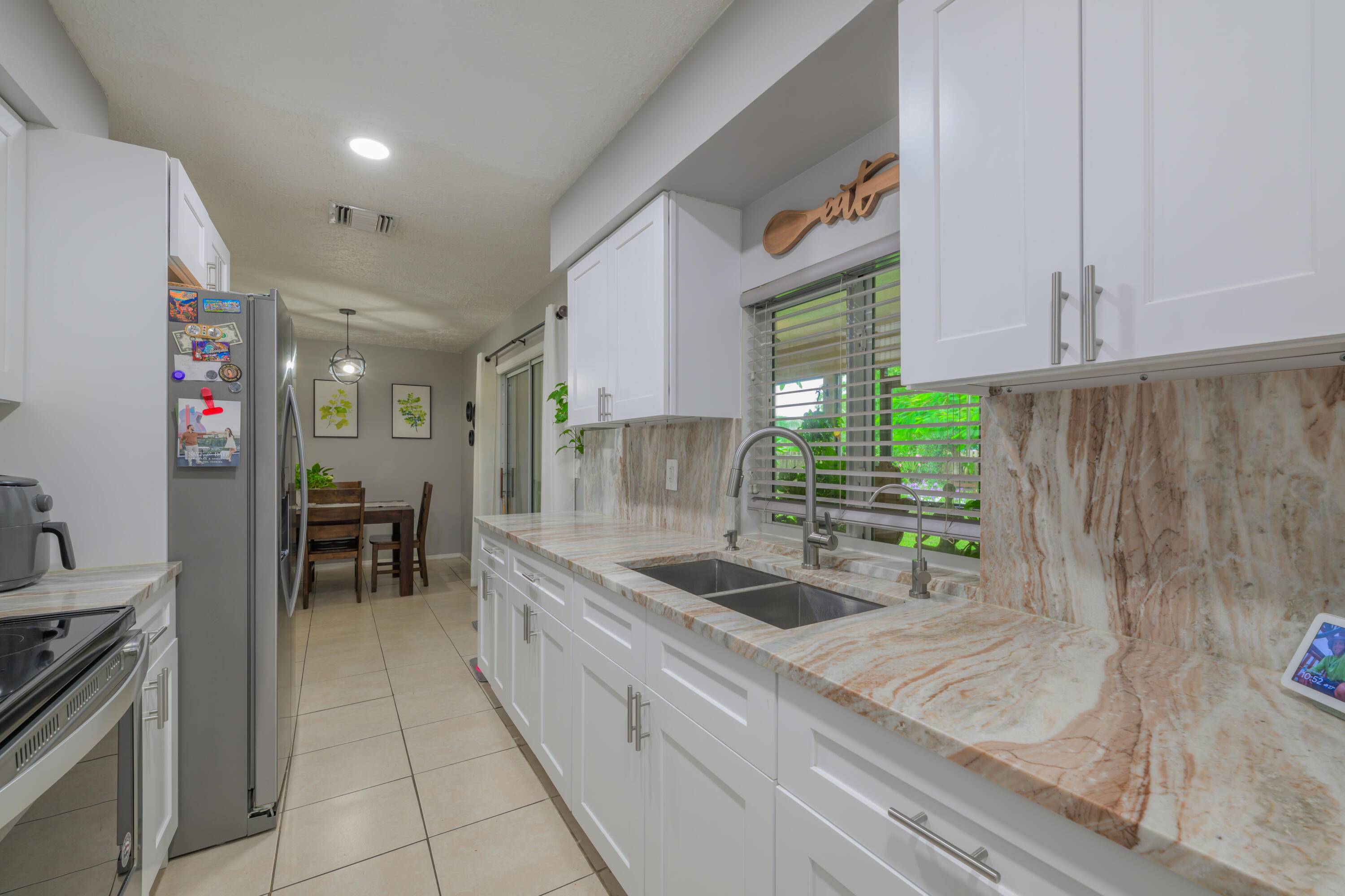 This lovingly maintained 2 bedroom, 2 bath home located at 738 NE Lanfair St, Port Saint Lucie, is truly a gem.