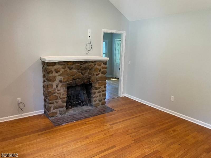 Renovated throughout. New Kitchen with high end appliance large center Island joins a semi formal Dining room.