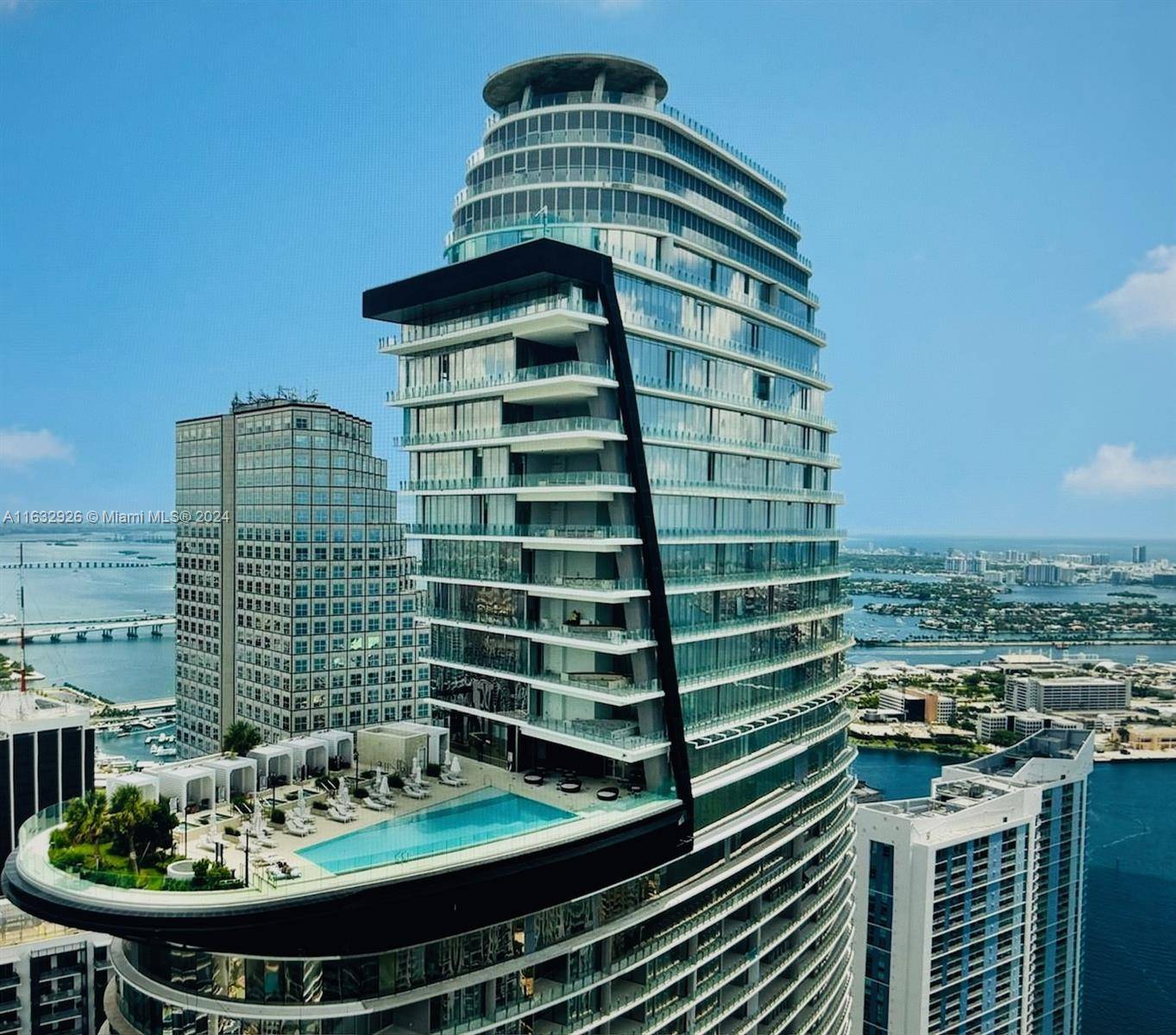 Luxurious Living at the prestigious Aston Martin Residences, this stunning residence offers breathtaking views of Biscayne Bay and the Miami skyline.