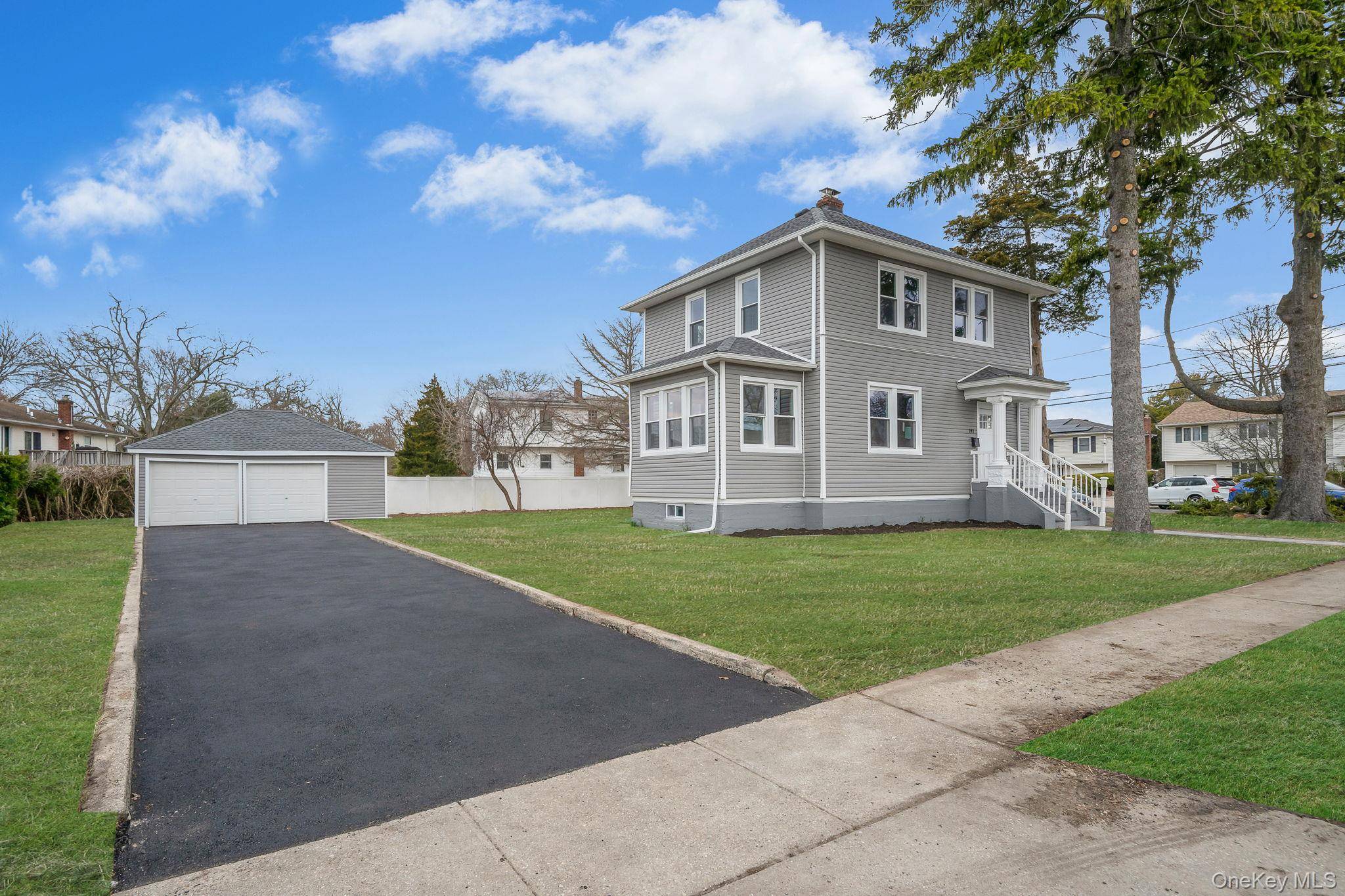 Welcome to this beautifully updated 4 bedroom, 2 bath Colonial, where modern design meets timeless charm.