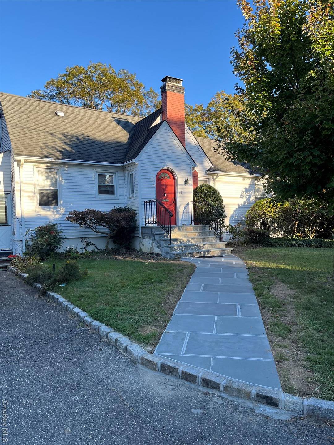 Charming Home on Private Beautiful Property with lovely sun porch.