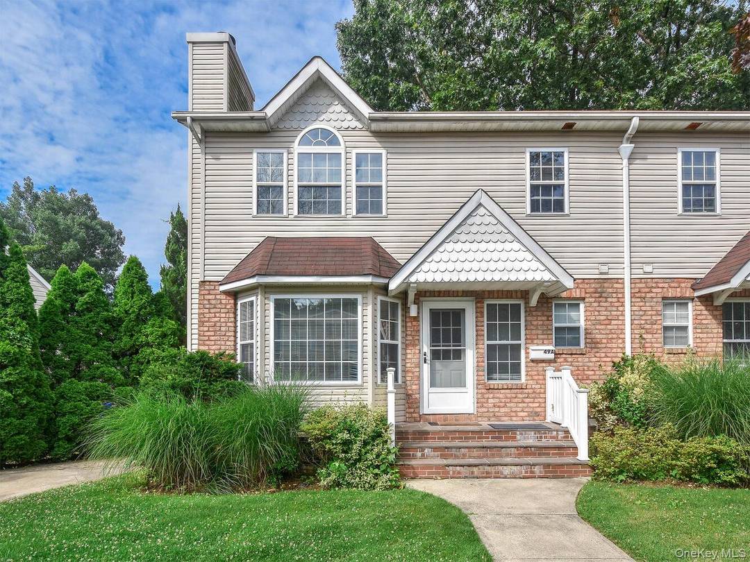 Duplex Townhouse in a sought after beach community featuring two spacious primary bedrooms, each with en suite baths.