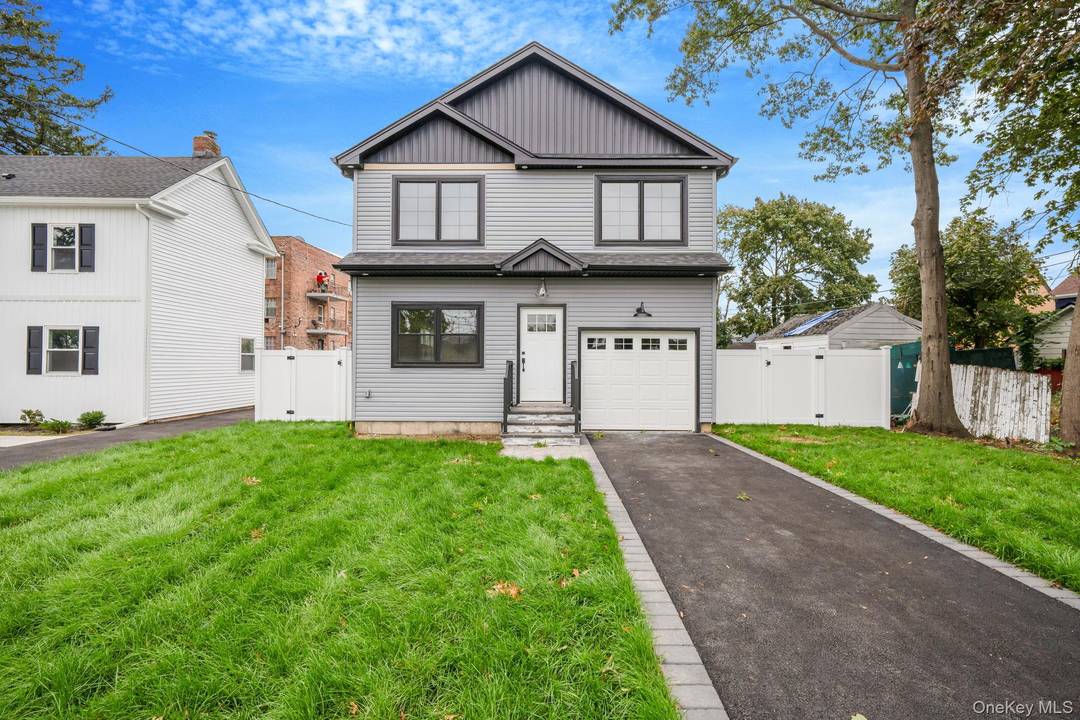 Discover unparalleled elegance on this quiet cul de sac in the Village of Hempstead, within the highly regarded Uniondale School District.