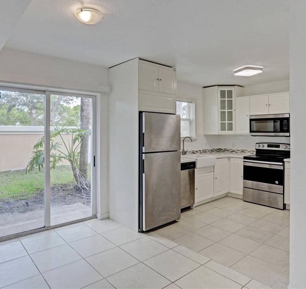 Spacious ground floor corner unit featuring 3 bedrooms and 2 bathrooms.