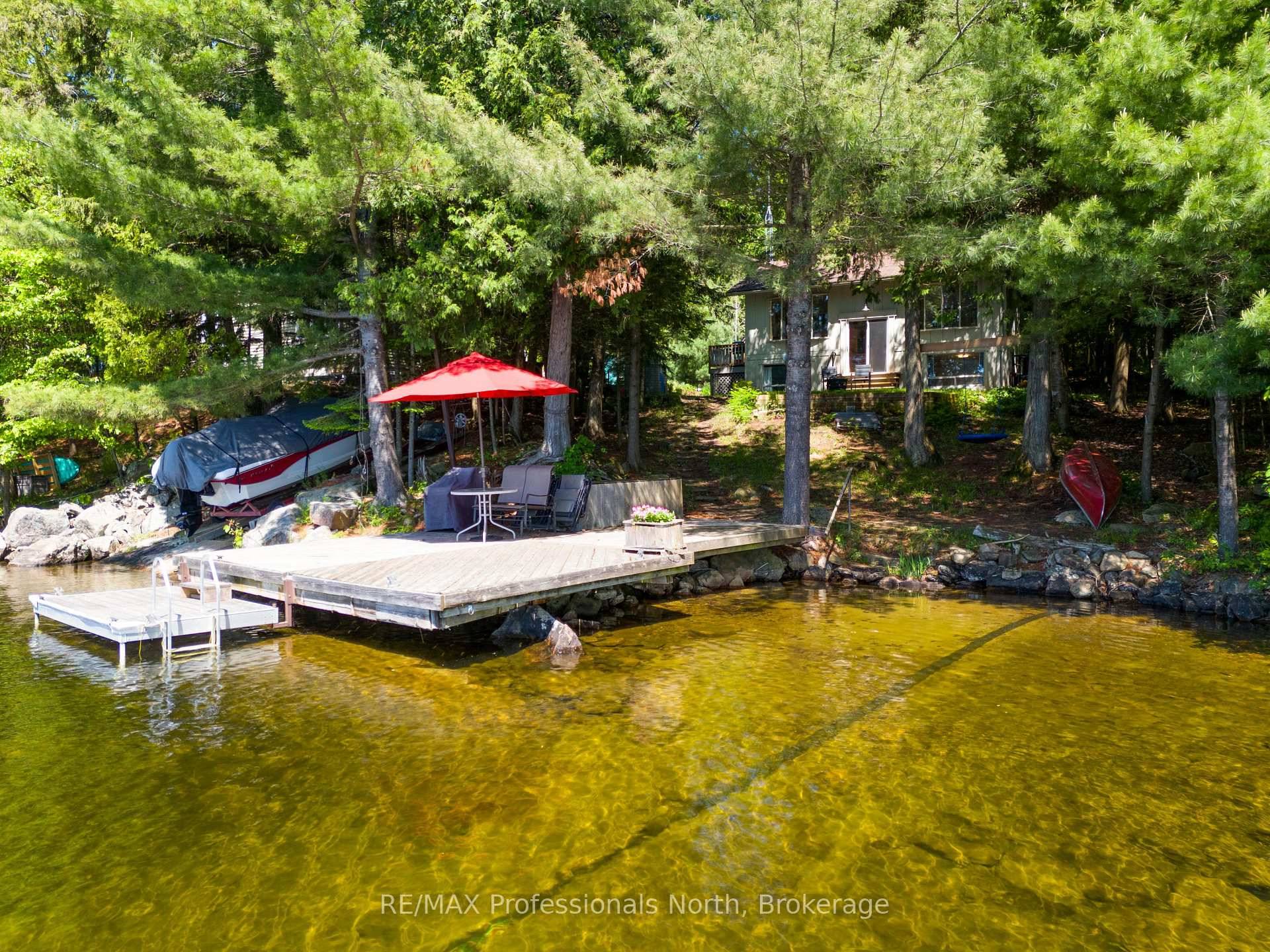 Nestled on the shores of Muskoka's Lake of Bays, this beloved four season cottage has been cherished by the same family for decades a true legacy of laughter, connection, and ...