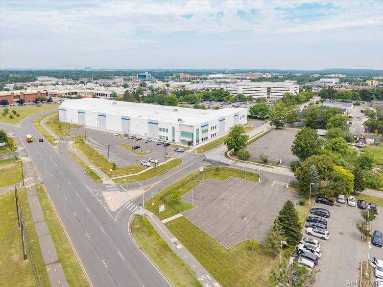 This is an opportunity to lease 2 gated and paved parking lots at the property located at 107 Charles Lindbergh Blvd.