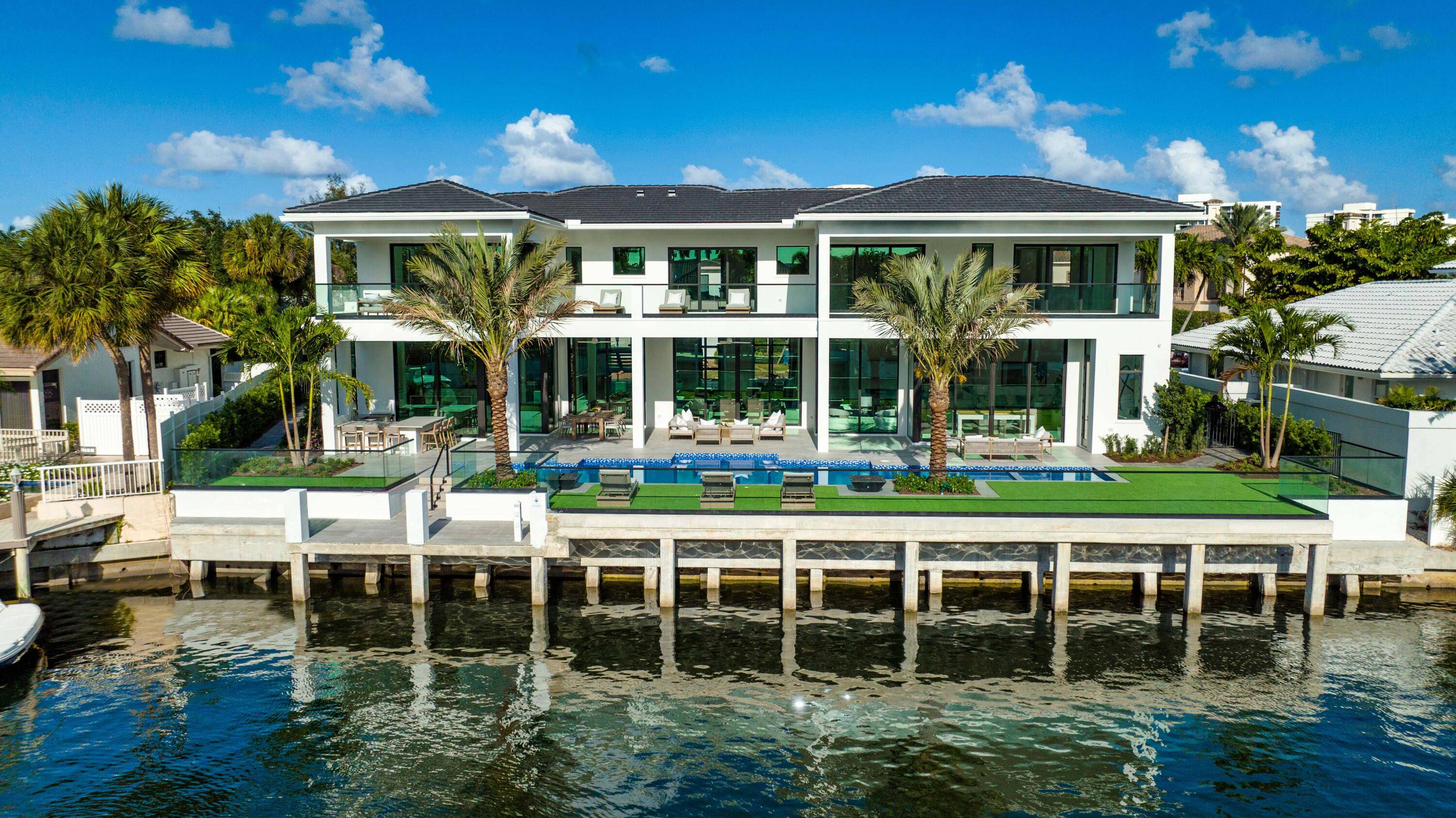 New Modern Architectural detailed Sanctuary Deepwater Estate sited on 102 feet of premier waterfrontage.