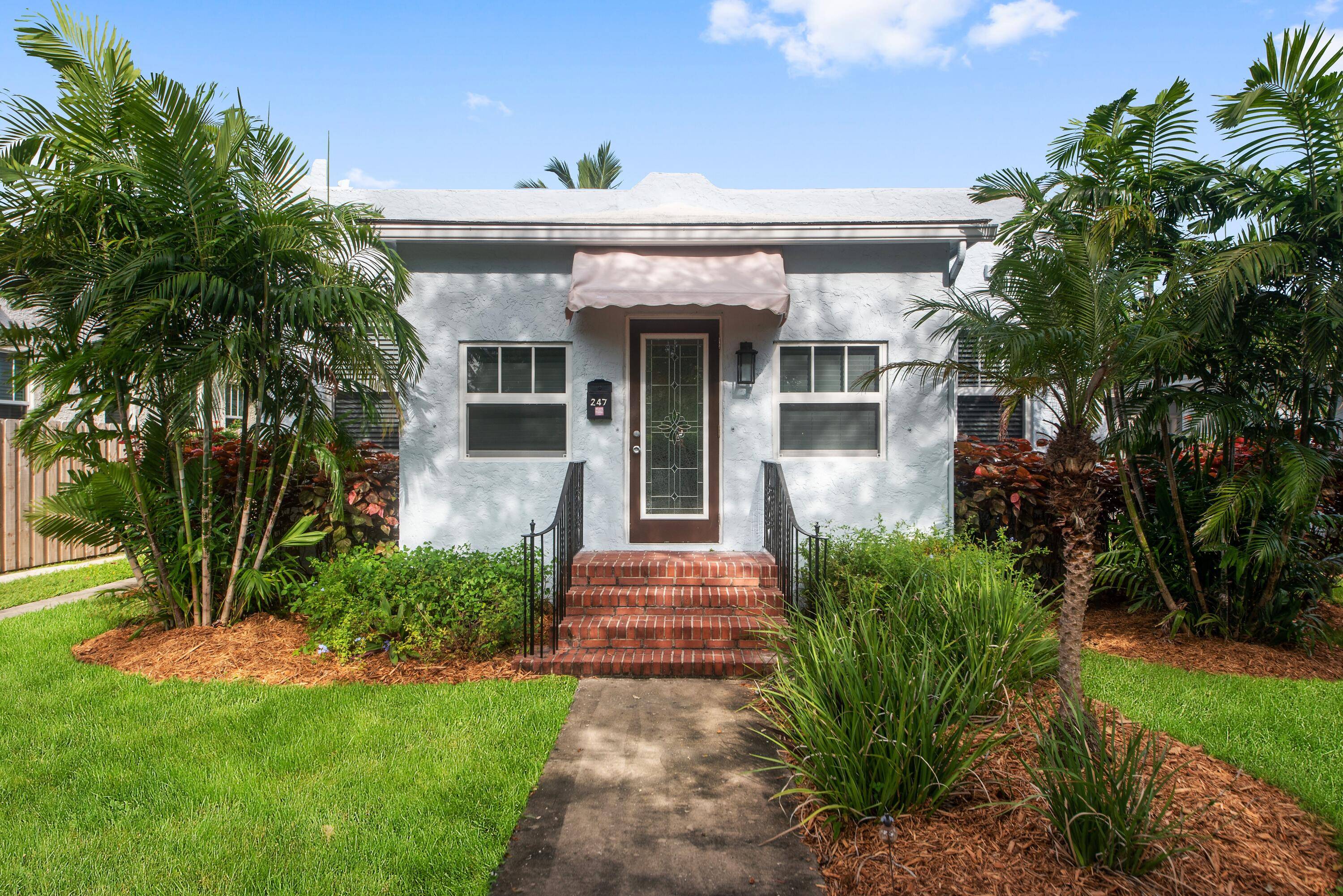 One of a kind historic 1926 Spanish style cottage renovated with all impact windows, renovated kitchen with stainless appliances and quartz countertops, newer AC, original Dade county pine floors, both ...