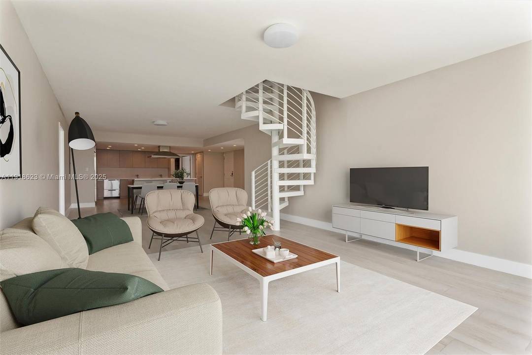 Exquisite duplex corner penthouse features modern design with 4 beds, 31 2 bath, enhanced by a private terrace with breathtaking sunset views.