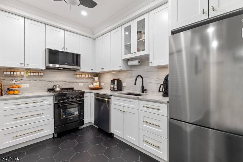 Private patio living in the sought after Hamilton Park area of Downtown Jersey City, this beautifully renovated two bedroom home combines modern upgrades, classic architectural charm, and an exceptional location ...