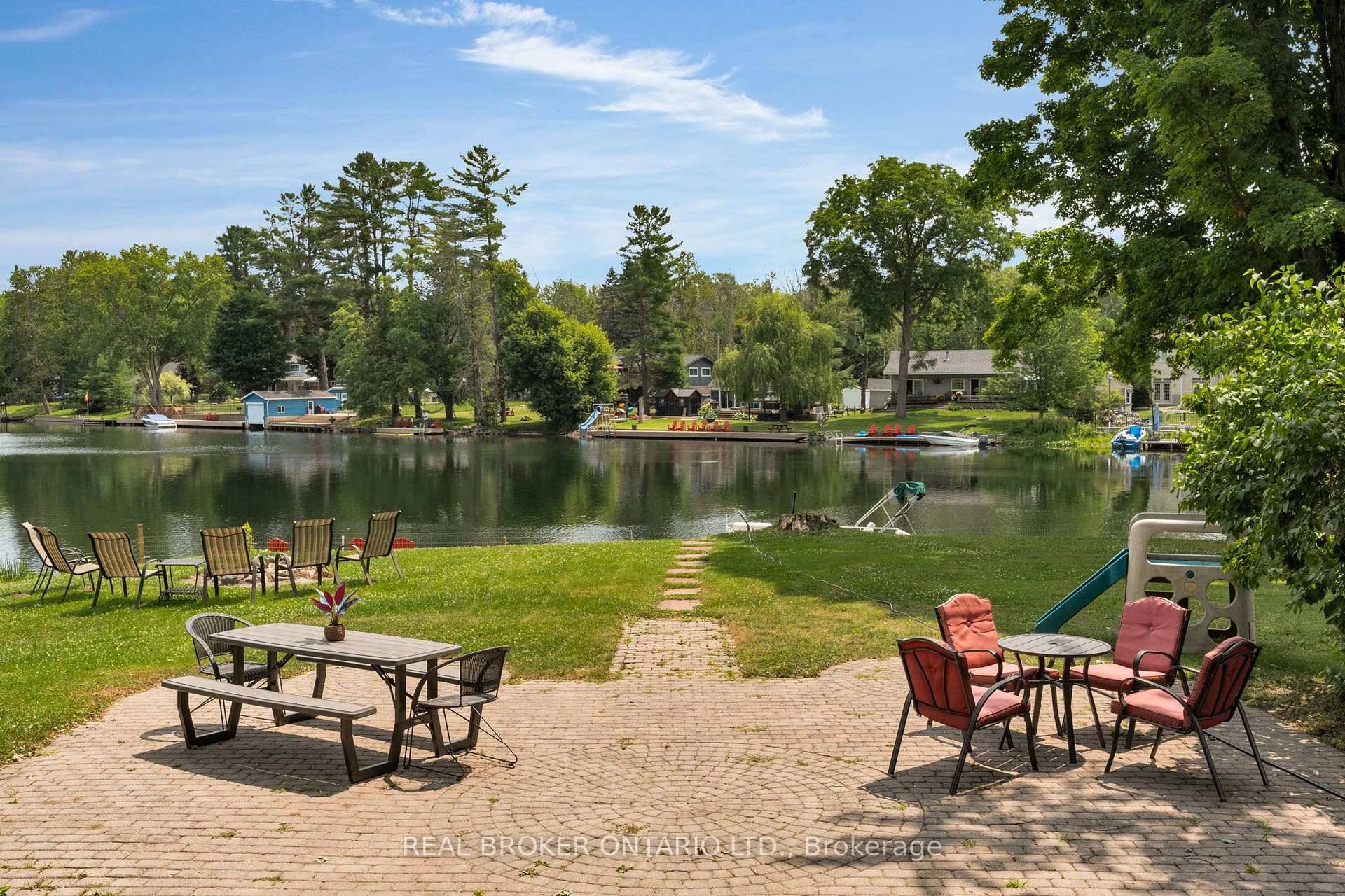 A rare show stopping Century Home on over 1 acre along the Severn River in Muskoka, featuring more than 380 feet of stunning waterfront.