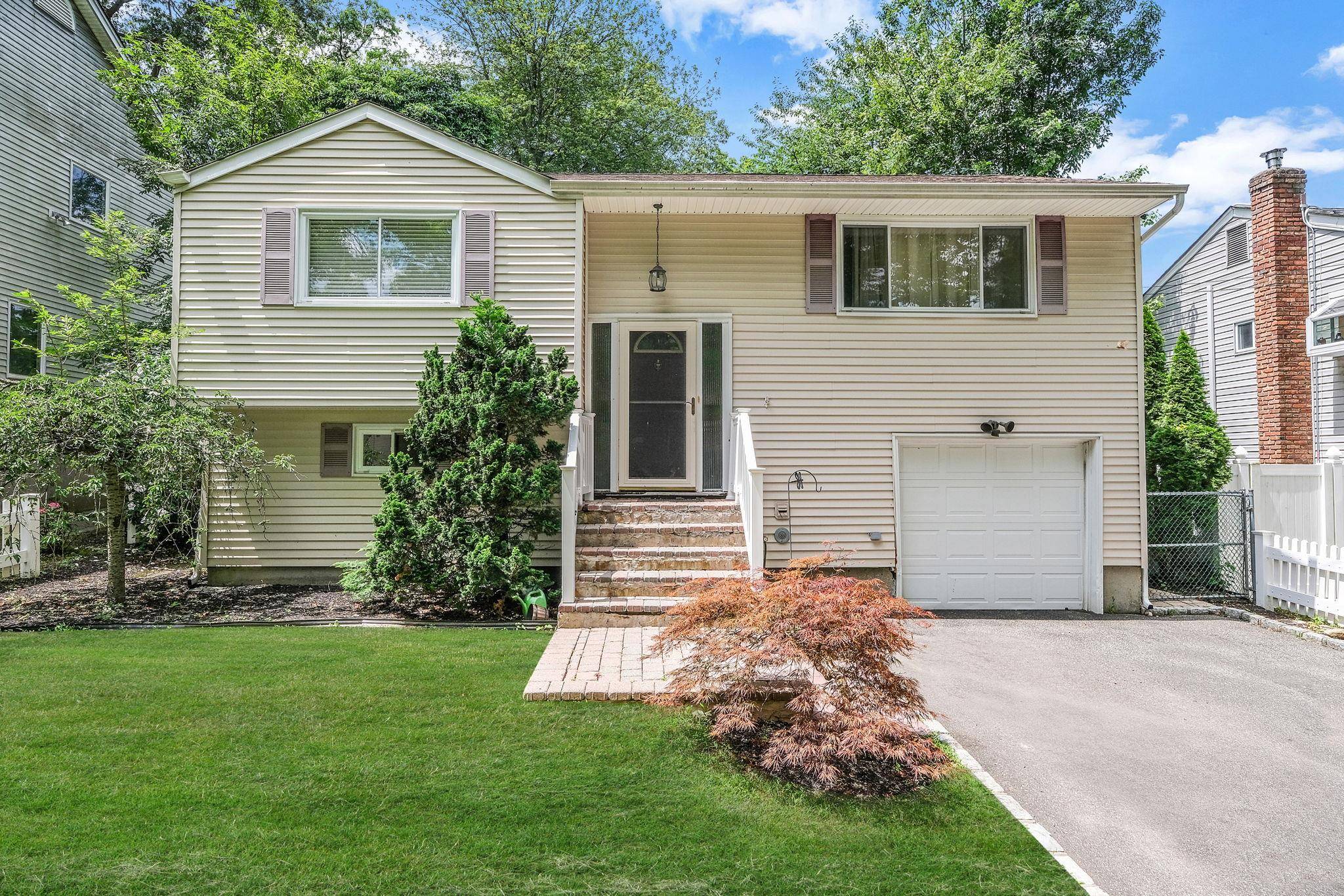 Welcome to this well maintained High Ranch offering versatile living space and income !