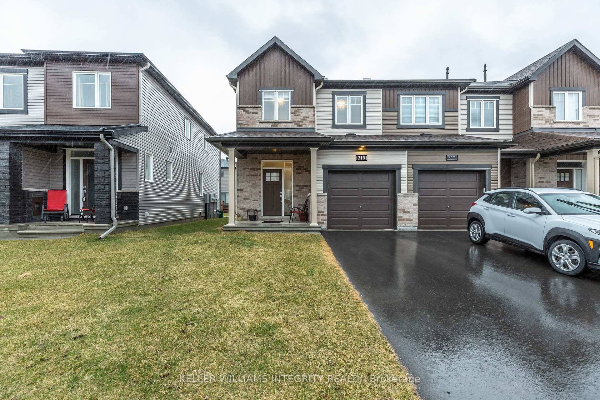 This beautifully upgraded executive end unit townhome in Avalon Encore offers over 1, 900 sq.