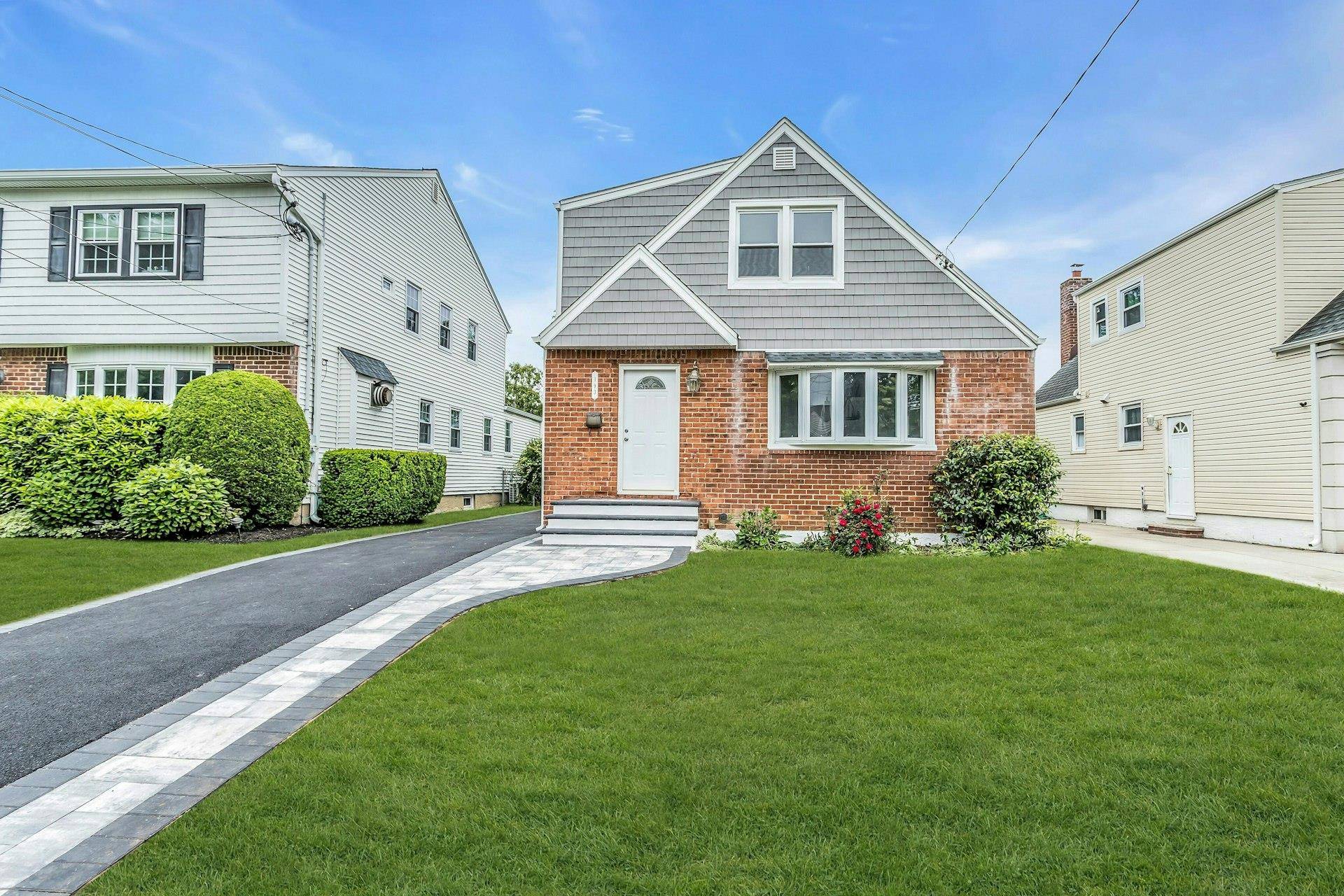 HEART OF THE VILLAGE, THIS NEWLY RENOVATED MOVE IN READY EXPANDED CAPE PRICED UNDER MARKET VALUE IS READY !