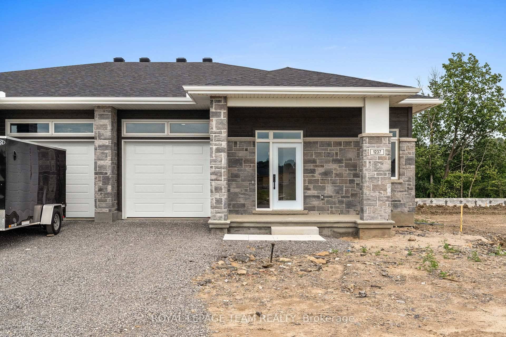 Set in Brockville's Stirling Meadows, this semi detached bungalow offers contemporary living with convenient access to Highway 401 and nearby amenities, including shopping, dining, and recreation.